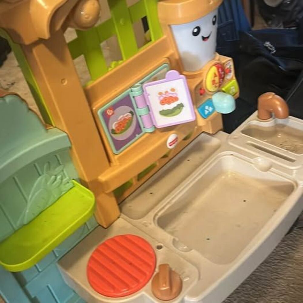 Fisher-Price Laugh & Learn Grow-the-Fun Garden to Kitchen